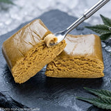 premium CBD Piatella hash block resting on a cold